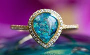 bedazzled cremation ring with cremation ash from pets and people